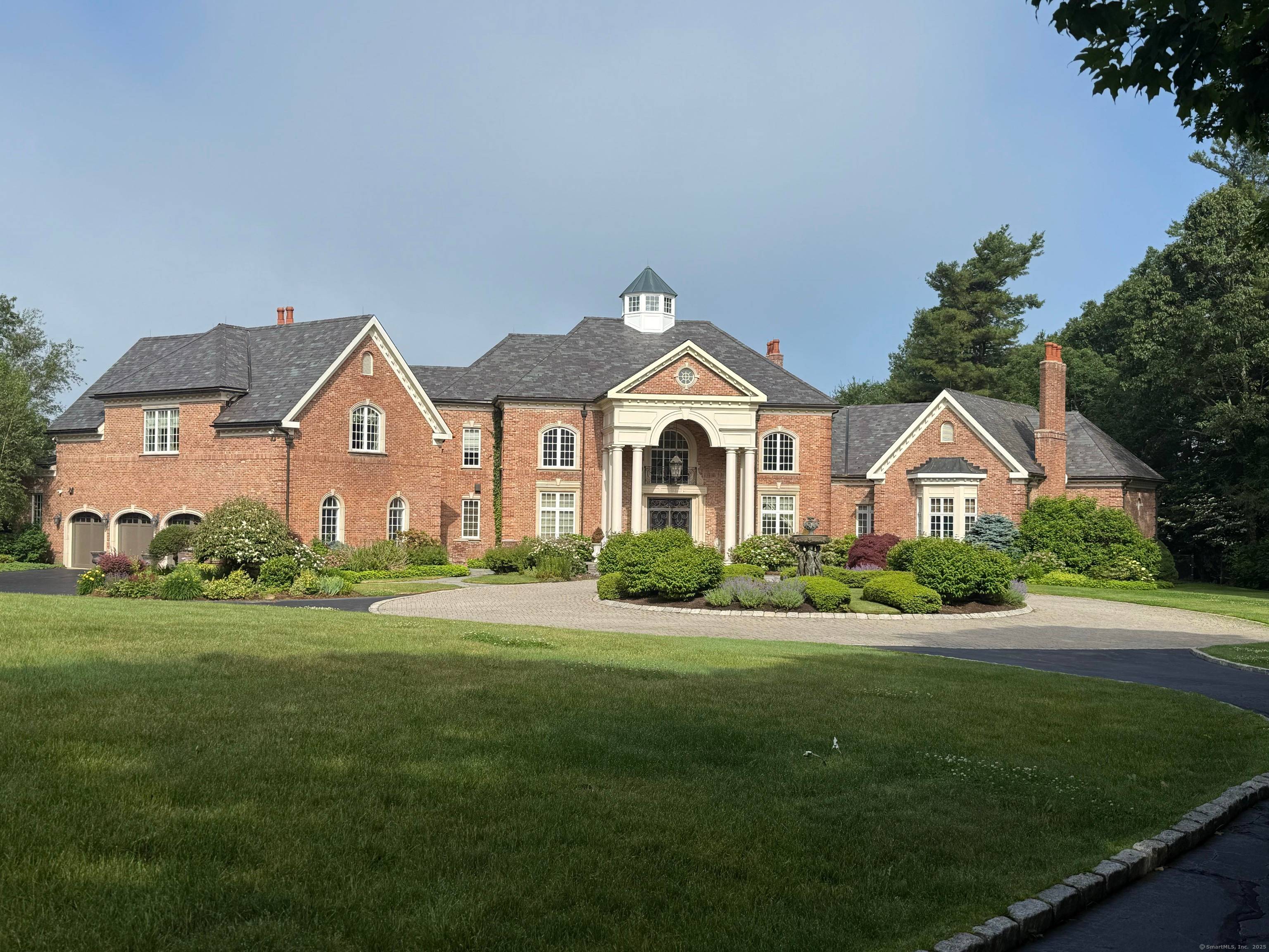 Luxury at its finest Views, Privacy Prominence in this prestigious European inspired gated estate anchoring this sought after cul de sac community.