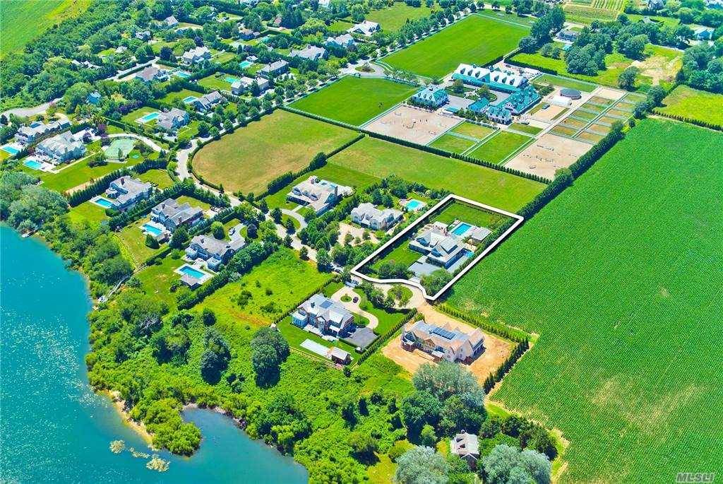This Masterfully crafted and timeless contemporary shingle style home took 2 years to be transformed into an award winning quintessential Hamptons property.