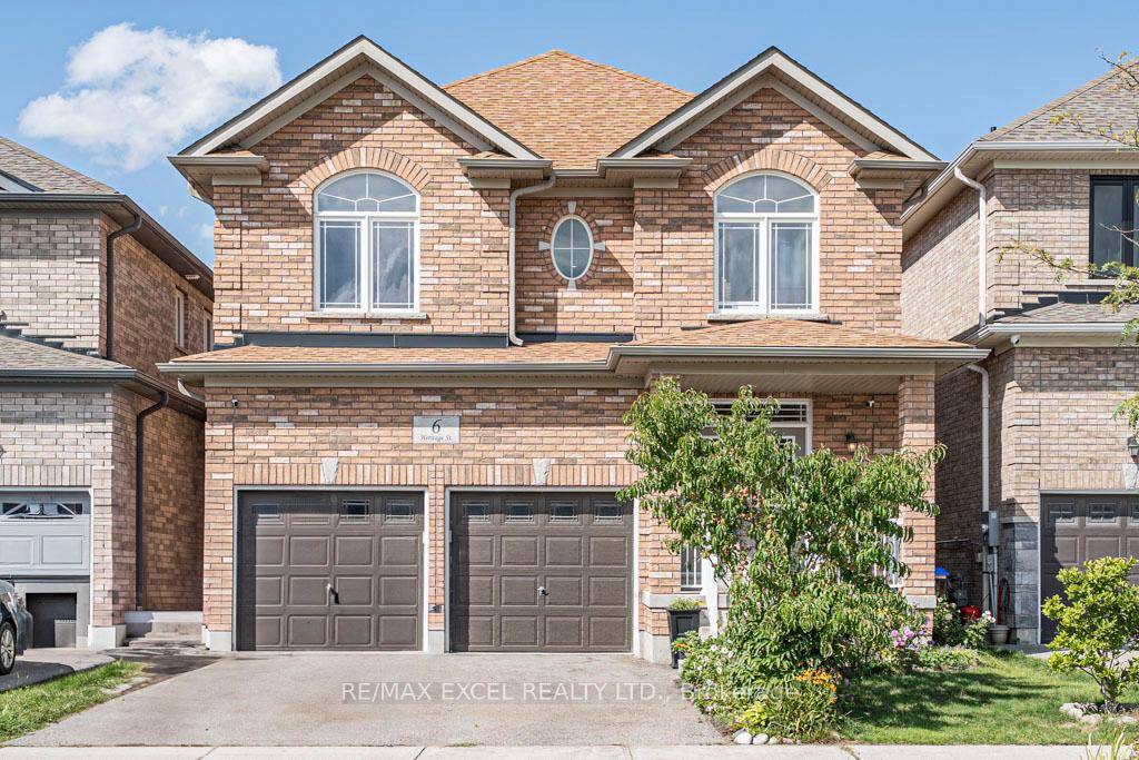 SUPER AFFORDABLE STARTER HOME WITH 2 GARAGE !