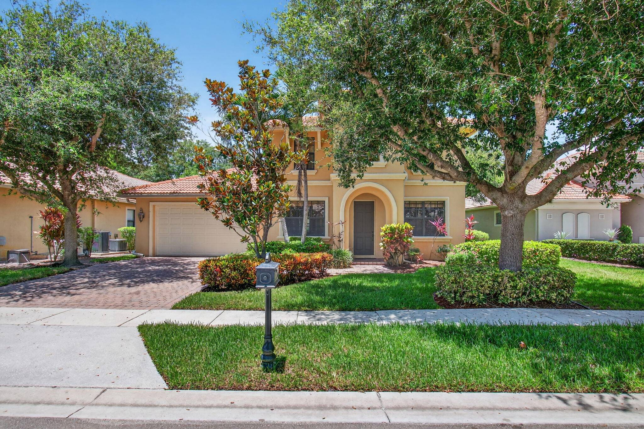 IMPACT GLASS THROUGHOUT Welcome to an elegantly appointed property positioned in the highly esteemed Casa Bella community of Delray Beach, Florida.