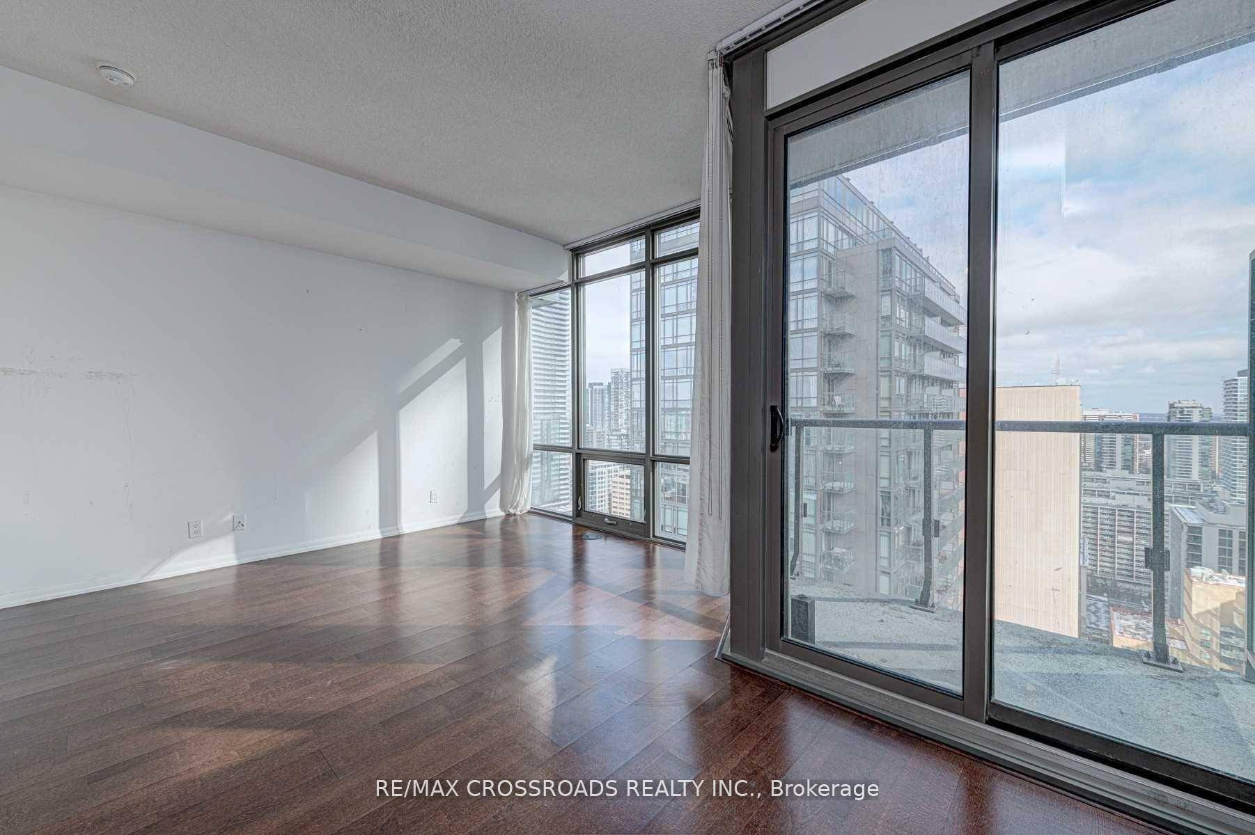 One Parking Included Bright East facing 30th floor 1 Bedroom Condo at Bay College Hardwood Floors, Kitchen W Granite Counter Top And Backsplash Ensuite Laundry High Walk score and close ...
