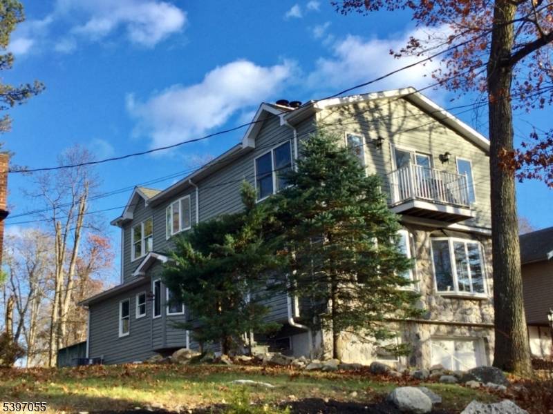 Move in ready and beautifully renovated, this exceptionally spacious home offers a stunning two story side entry foyer and a brand new kitchen with a separate dining area, plus a ...