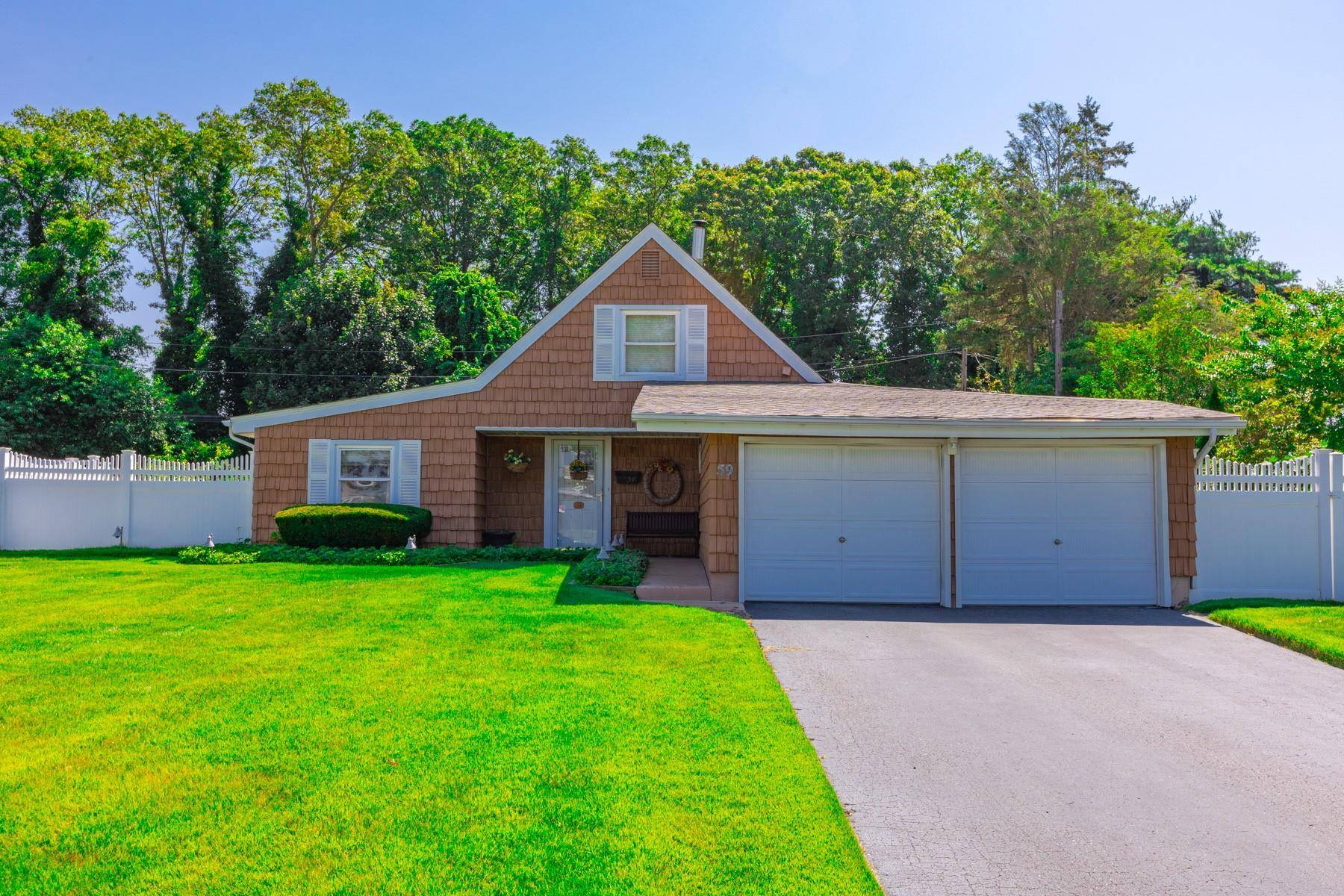Welcome to this beautifully maintained 4 bedroom, 2 bathroom Farm Ranch nestled on a generous 75x150 lot in the heart of Islandia !