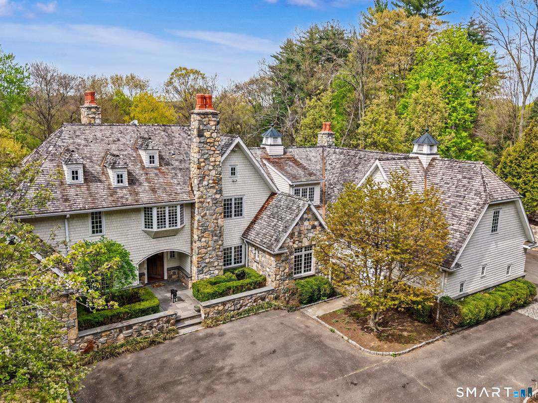 Set at the end of a private cul de sac in Westport's coveted Coleytown neighborhood, 5 Michele Lane is a statement of craftsmanship, scale, and resort style living.