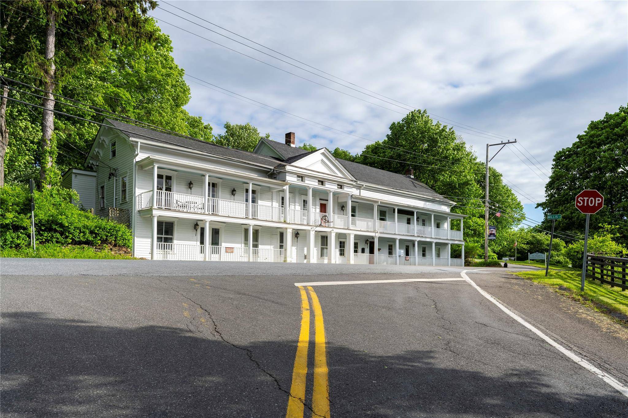 ZONED MIXED USE. This is Bullis Hall, the circa 1800 s Greek Revival landmark in the picturesque and historic hamlet of Bangall in Stanford, NY.