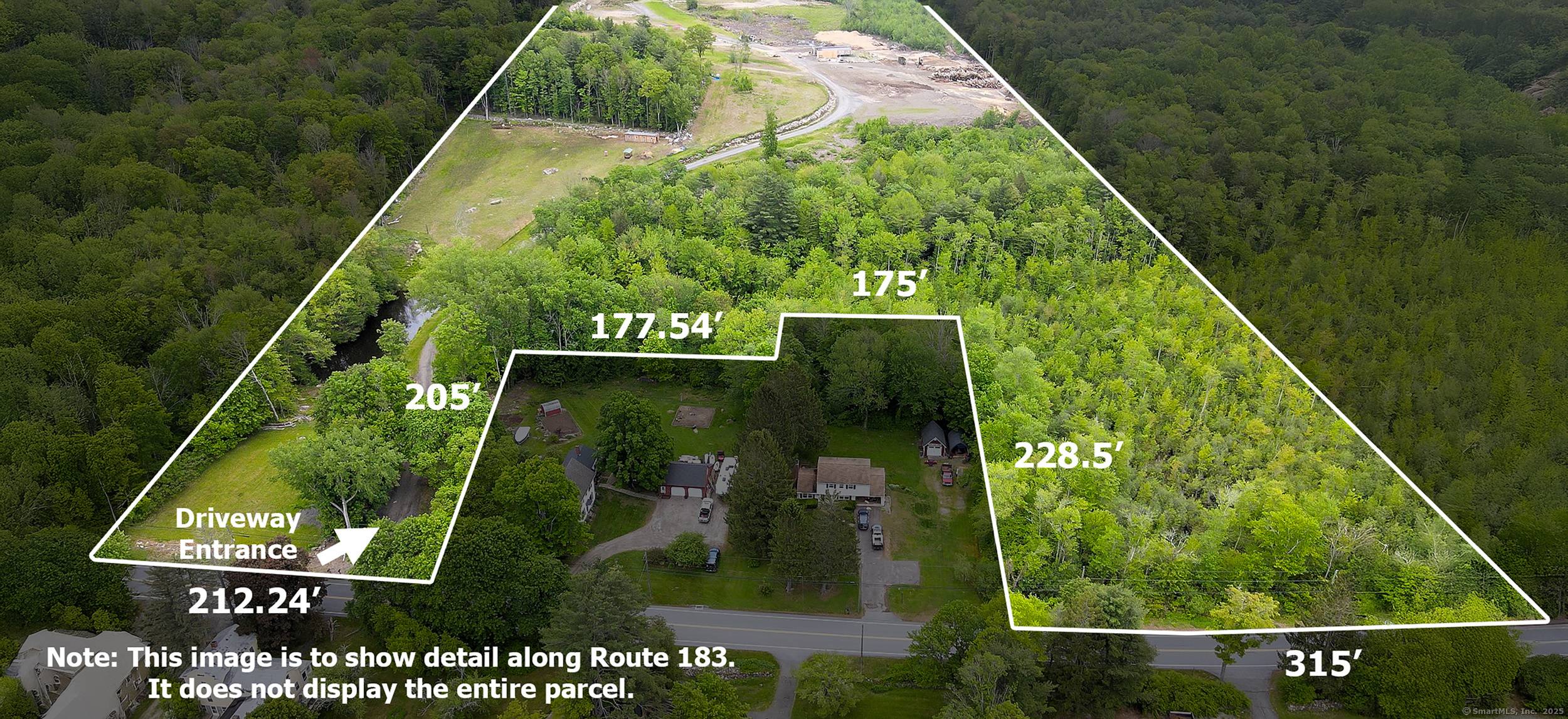 65 Acre Property with infrastructure and natural features.