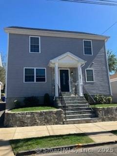 Remodeled colonial with 8 rooms, 5 bedrooms, 3 full baths, finished attic not included in the 1920 square feet of living space, full basement and a 2 car garage detached.