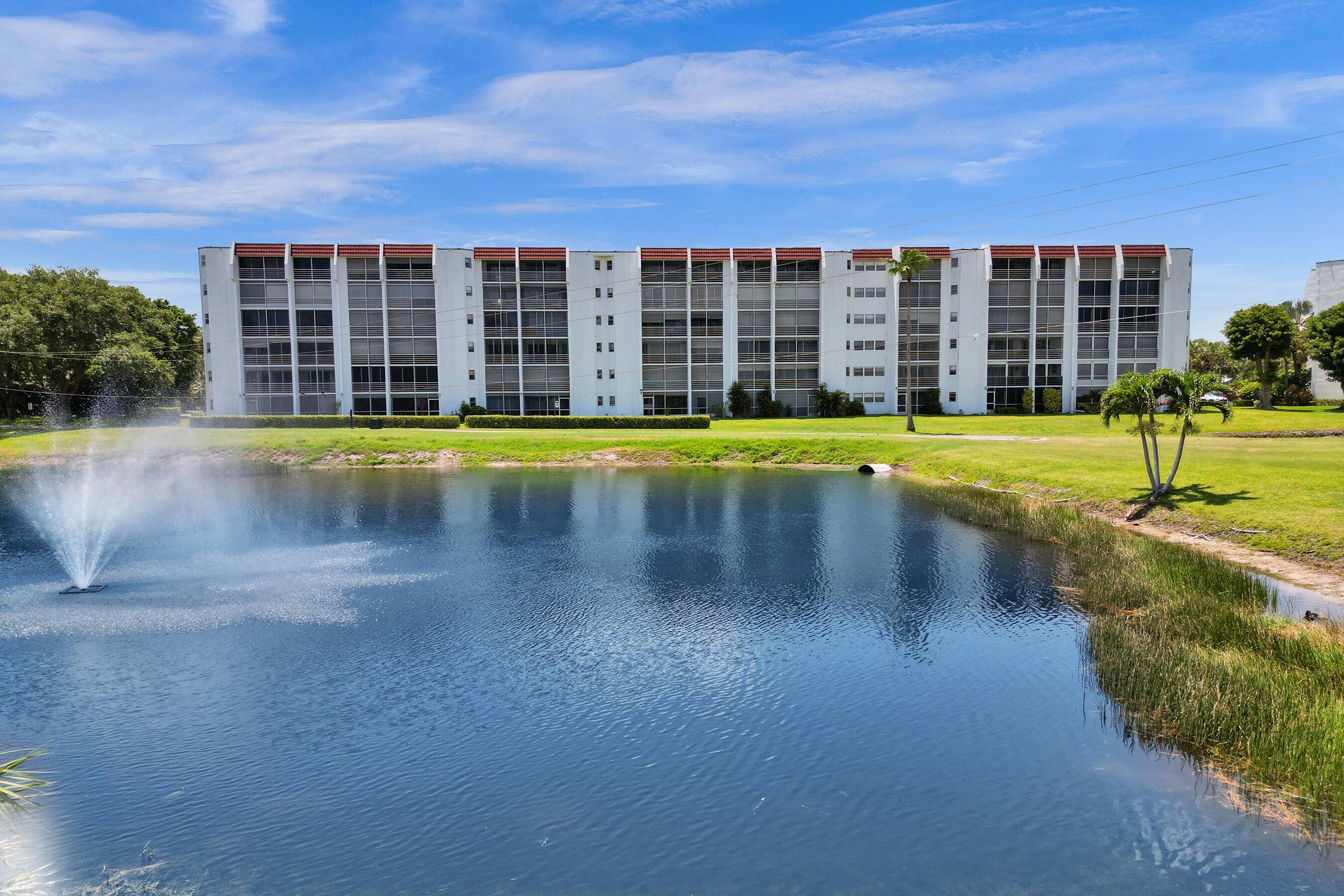 This is the one ! This bright condo has both water golf views from the screened enclosed east facing balcony !