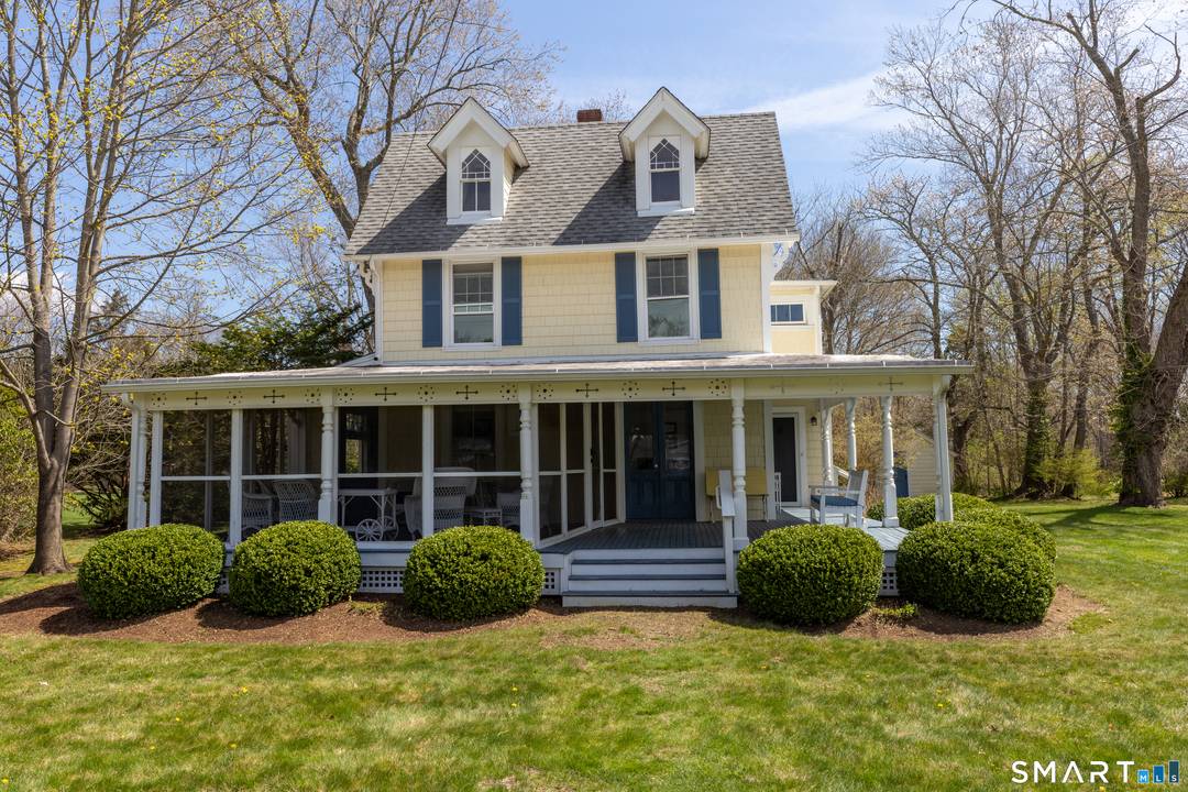 Experience the ultimate in Victorian Cottage Chic with this 1890 gem, perfectly set on a level, lush 0.