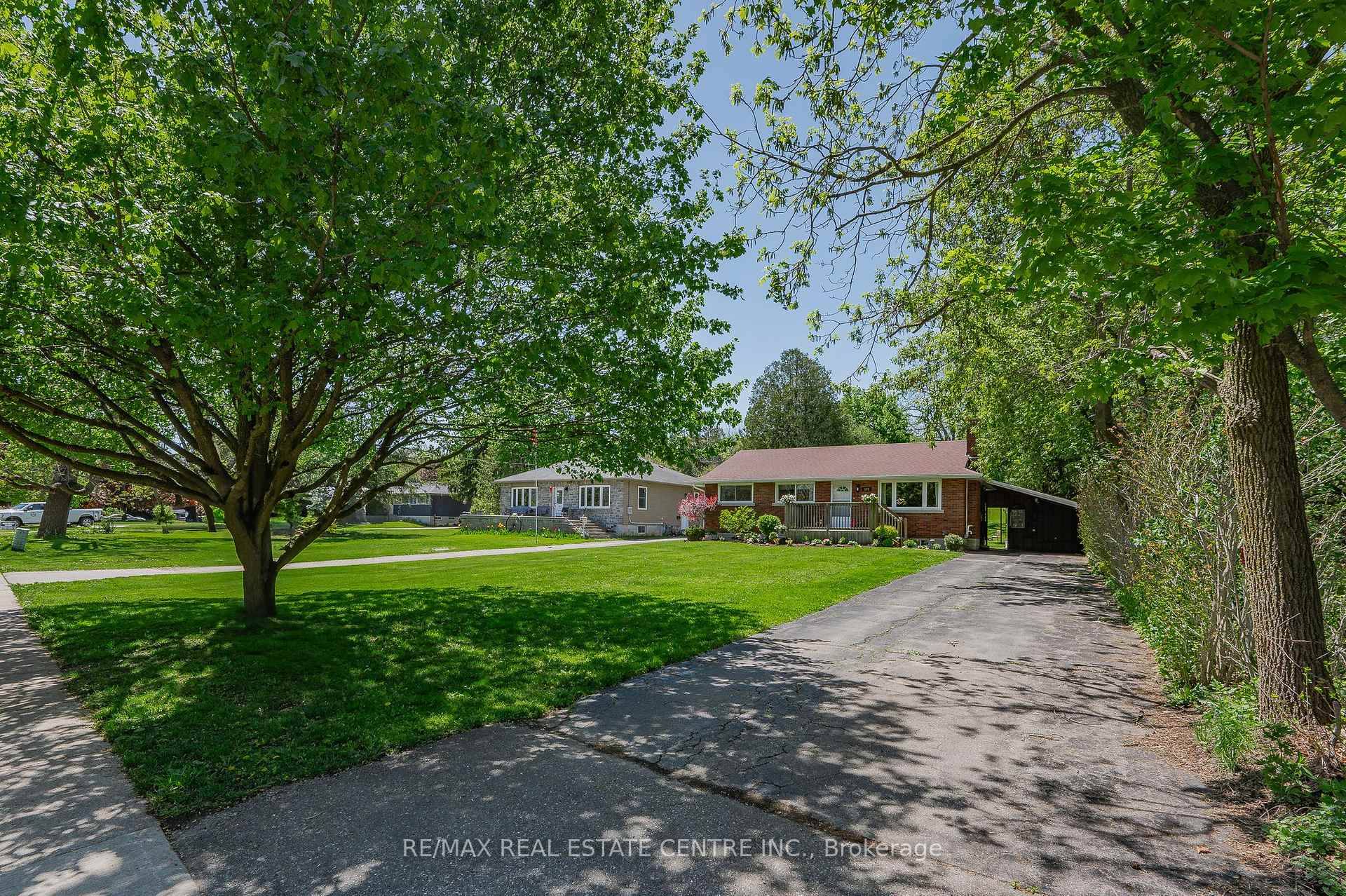 COUNTRY IN CITY ! This 3 Bedroom All Brick Bungalow with a Newly Renovated 1 bedroom in law set up, is move in ready !