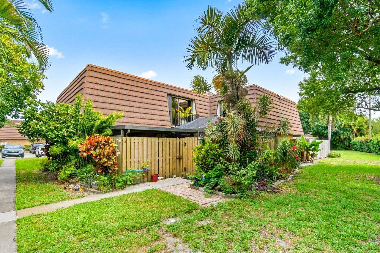 Don't miss this unique, one of a kind townhome in the highly sought after Garden Lakes community with low HOA dues !