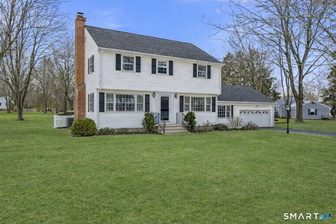 Classic Colonial tucked away on a quiet dead end street in desirable Branford.