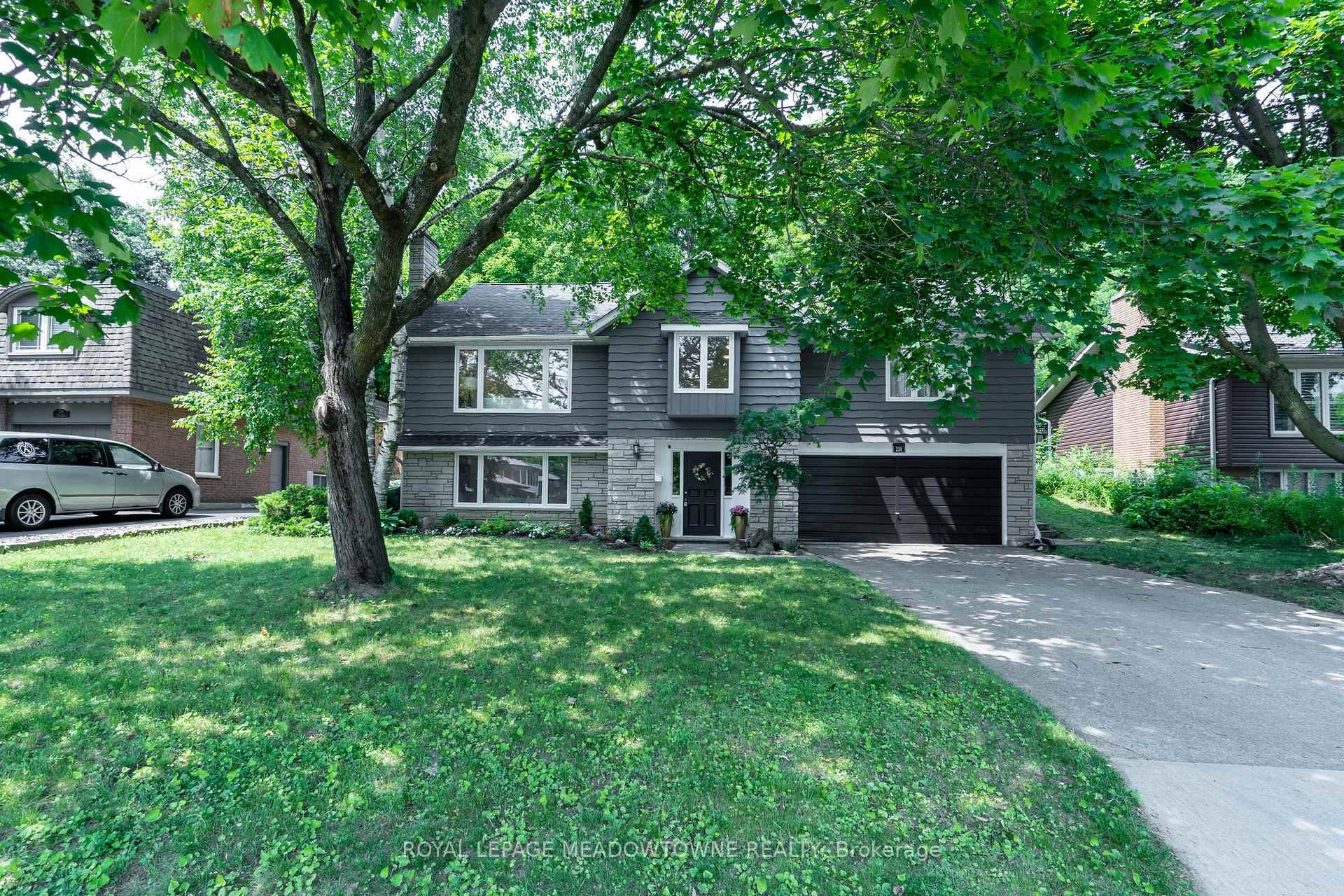 Beautiful, raised bungalow tucked into a quiet, mature neighbourhood with wide lots and a private backyard that backs onto a park with gated access.