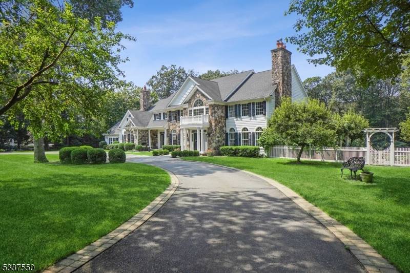 Classic elegance defines this custom CH Colonial by Bennett Homes, privately situated on a quiet cul de sac in Forrest Hill on Chester's east side.