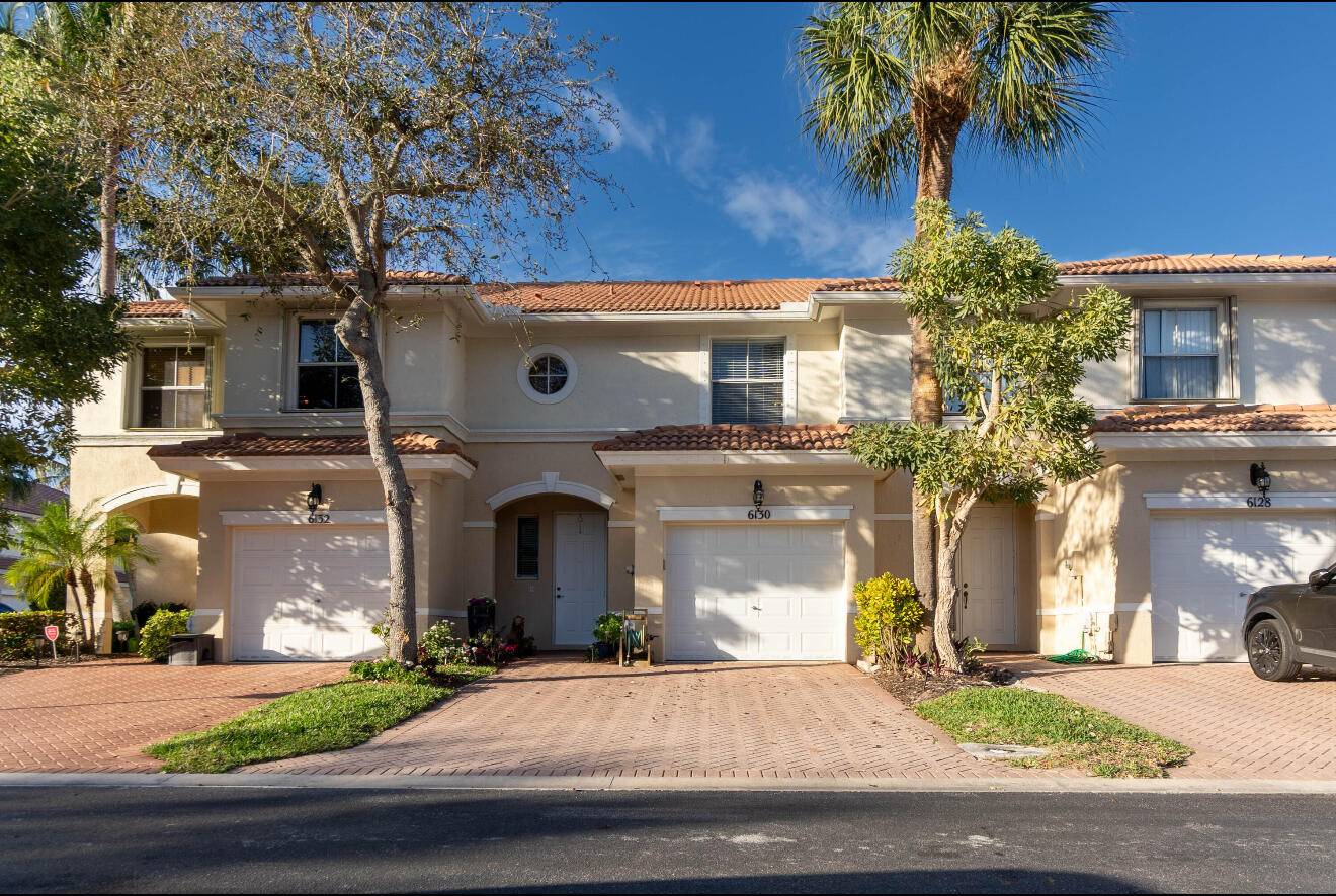 This well kept townhome with a garage is located in the heart of Northern Palm Beach County.
