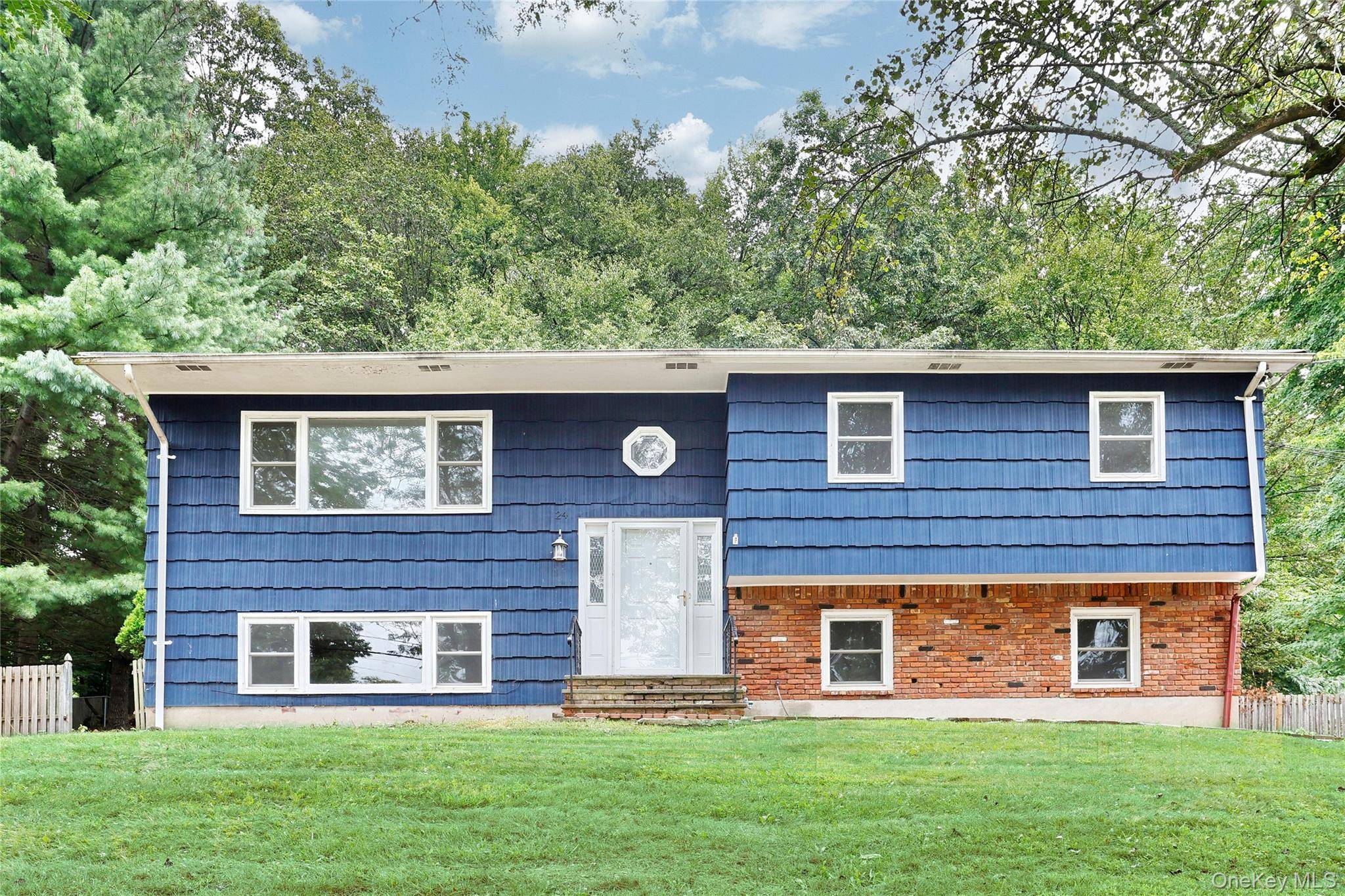 Welcome to 24 Wallace ! This beautifully maintained extended high ranch features 4 bedrooms and 3 bathrooms, offering ample space with 2, 252 sq.