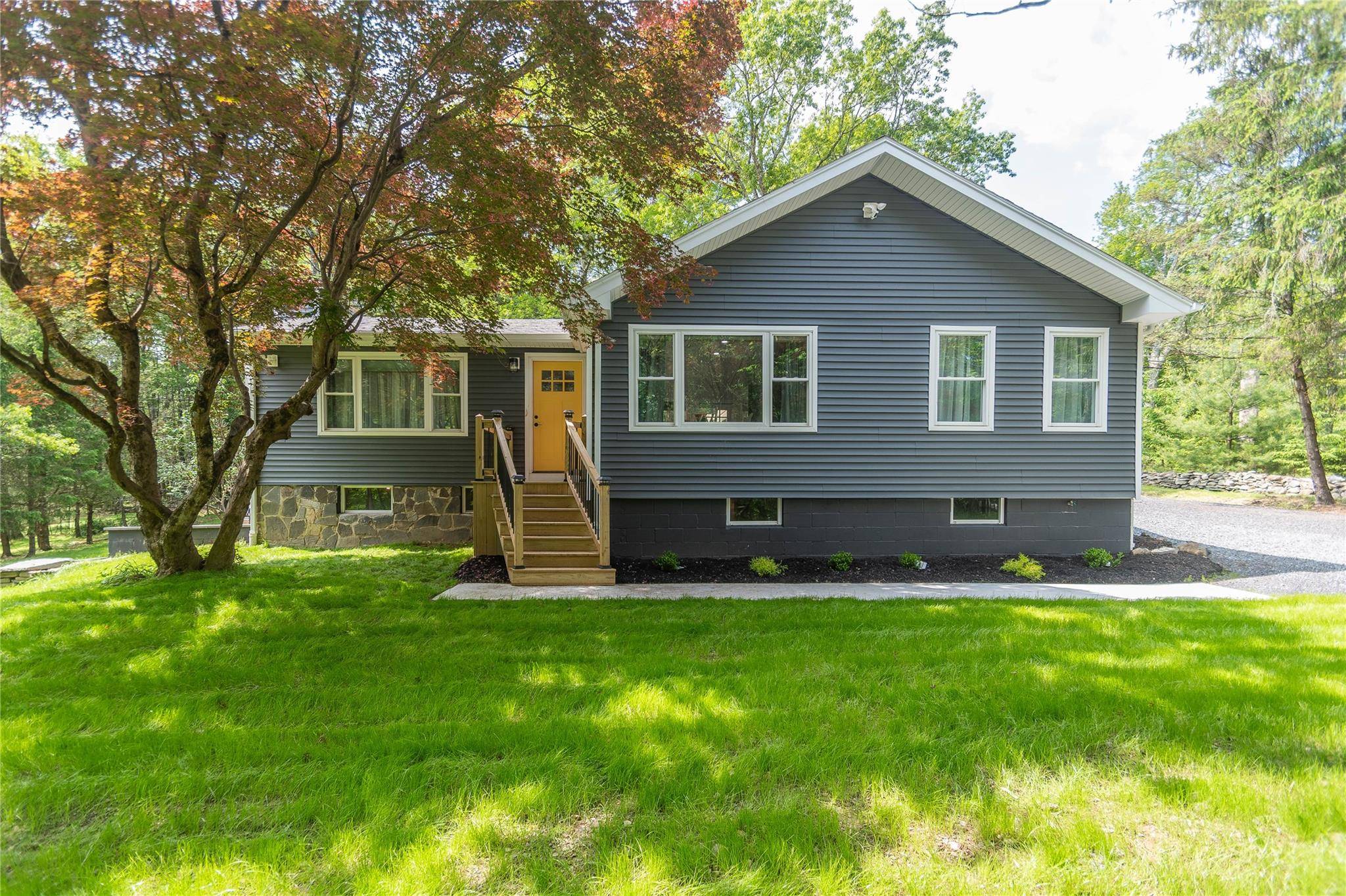 Nestled in the Catskill Mountains, this beautifully renovated 2 bedroom, 1 bath home on 2.