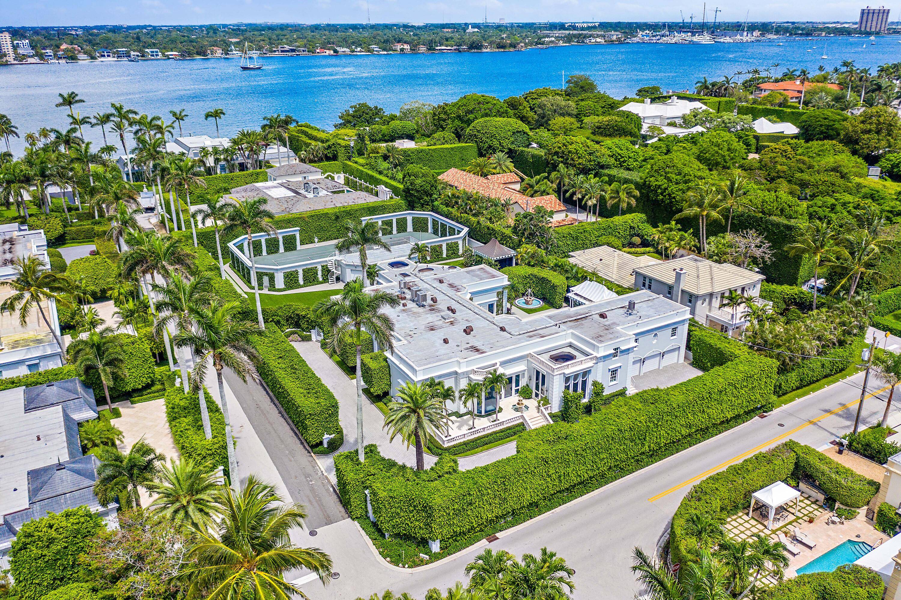Pristine and secluded estate home sits regally on a nearly 38, 000 SF highly elevated lot.