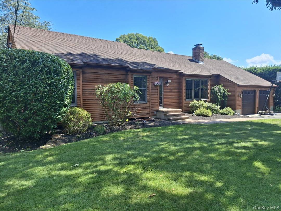 Welcome to this beautifully maintained 3 bedroom, 2 bath ranch set on a pristine half acre.