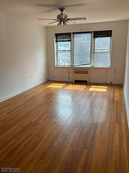 OVERSIZED 904 sq ft, first floor, south facing, end unit condo with plenty of closet space in the heart of Jersey City's desirable McGinley Square.