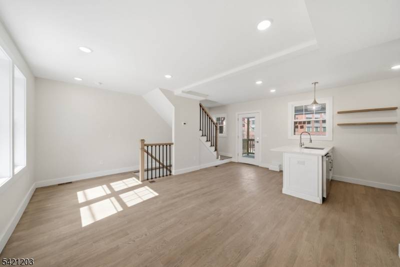 Totally renovated townhouse featuring 2 bedrooms, 2 full baths, and two dedicated parking spaces a rare find in the heart of Morristown.
