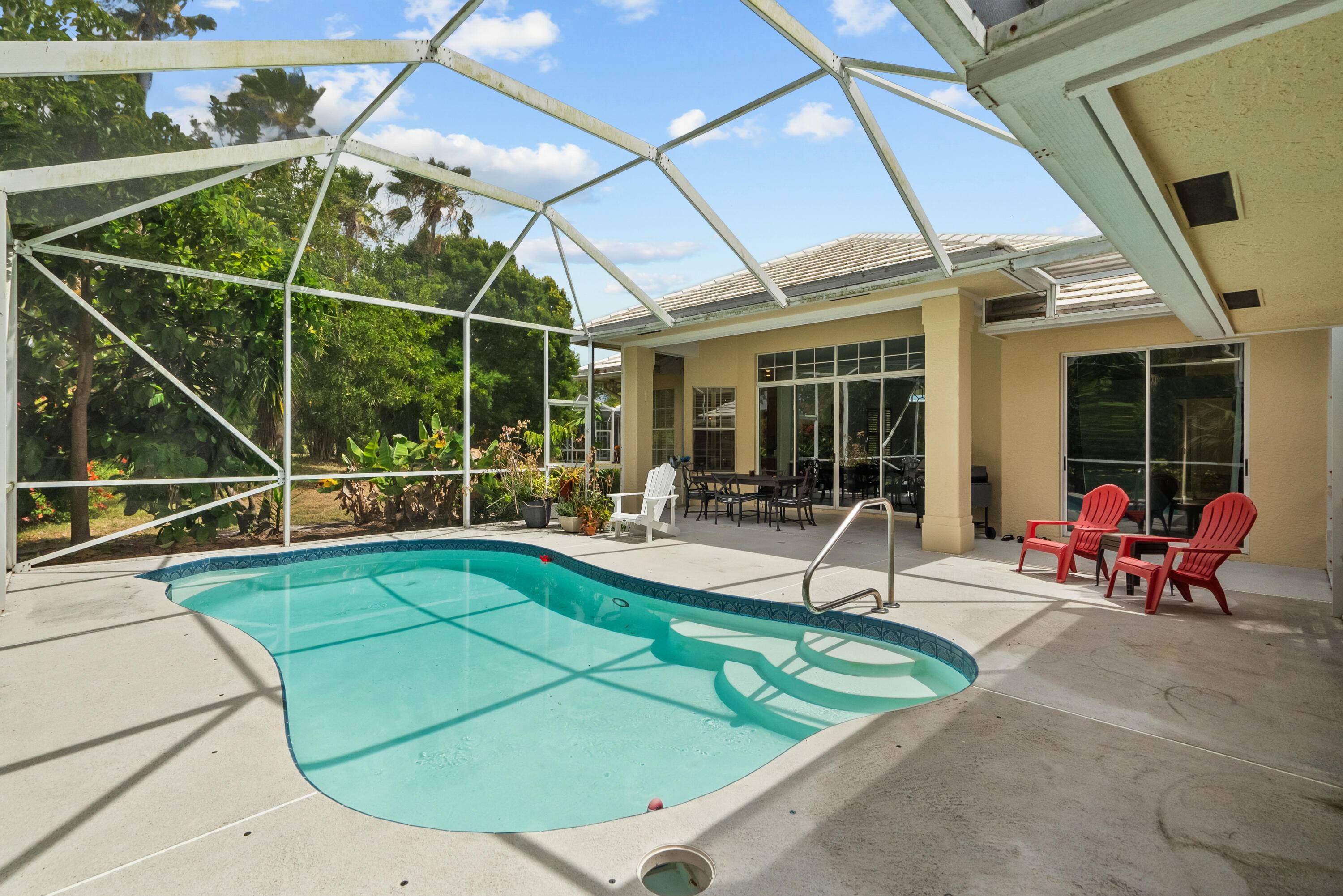Discover serene living in this charming CBS home in Fairway Isles, a sought after community located in the vibrant St.