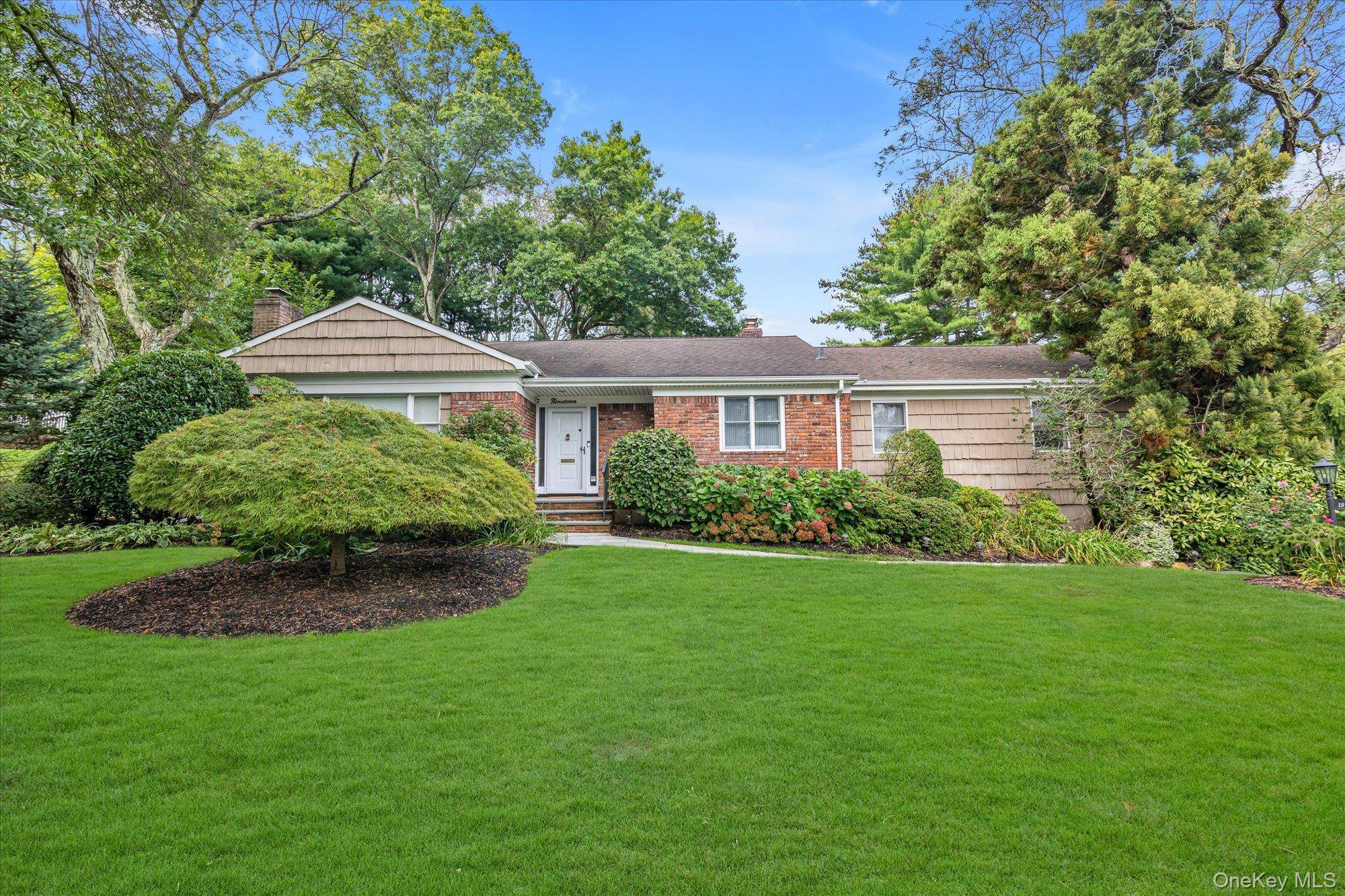 An exceptional opportunity awaits in the prestigious Lakeville Estates of East Hills.