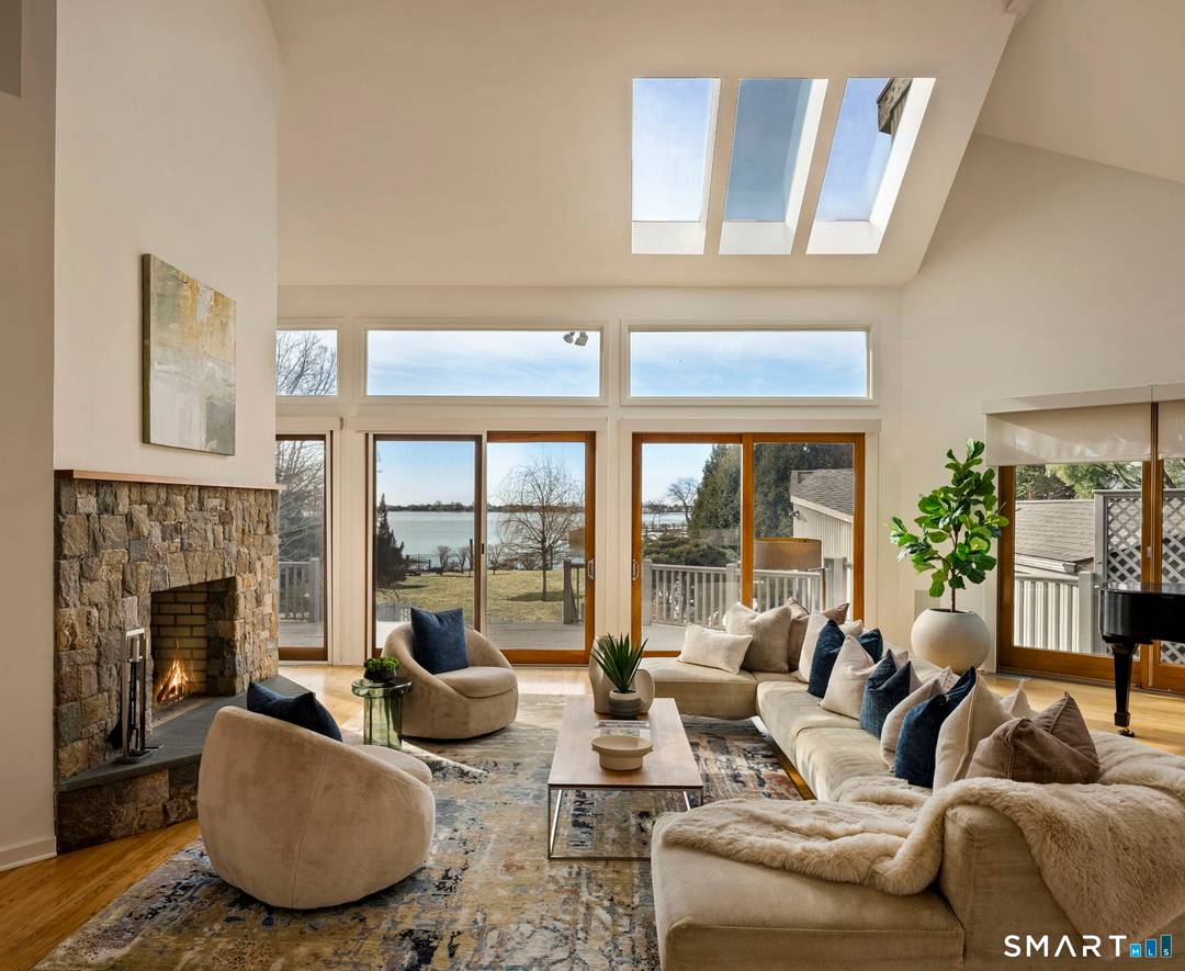 Set on over 3 private acres with sweeping water views, 2 Judy Point Lane is a remarkable Westport waterfront estate offering approximately 14, 000 square feet of living space and ...