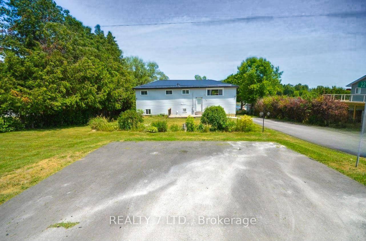 A Rare Waterfront Gem Year Round Living on Chemong Lake !
