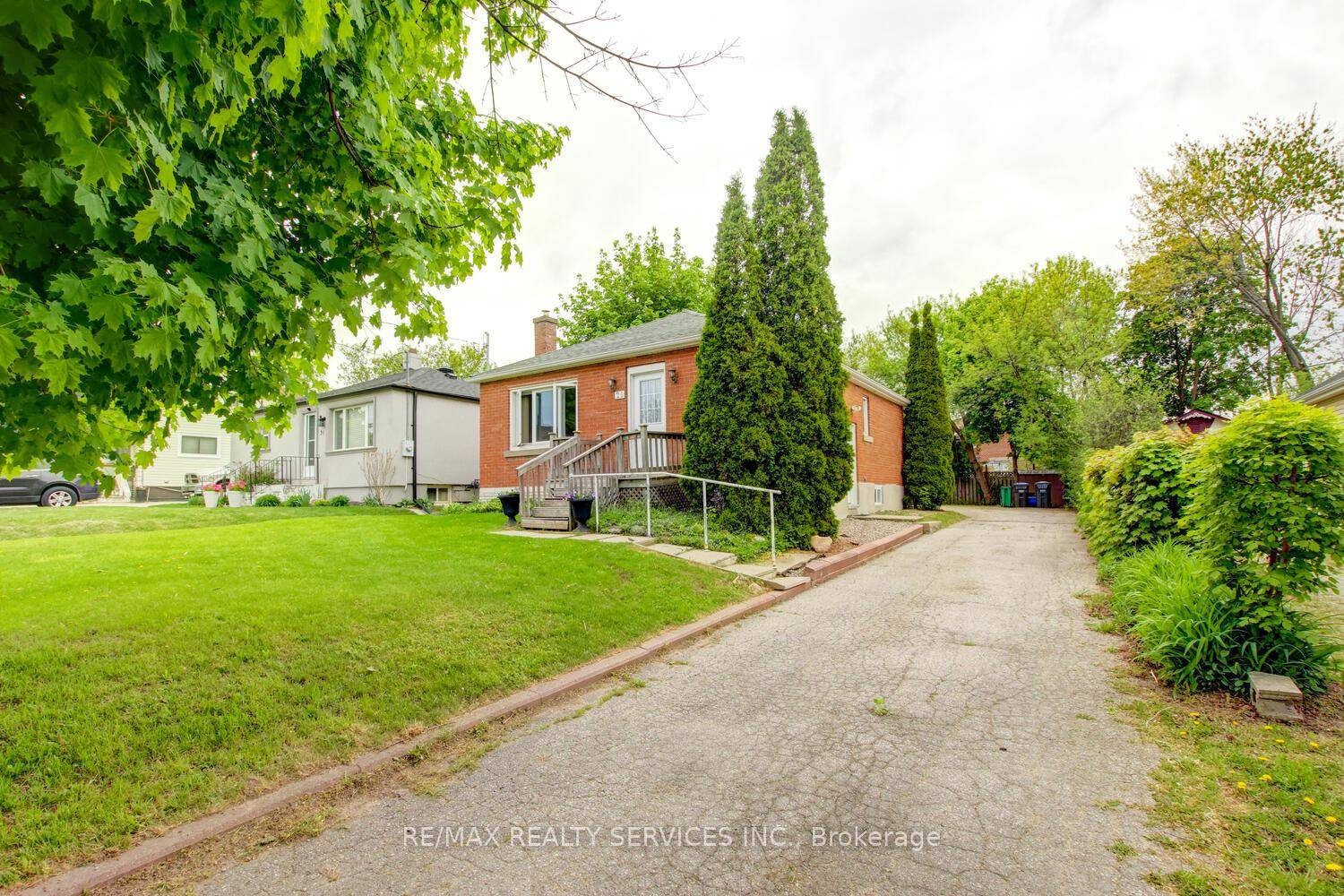 Beautiful 2 2 bedroom, 2 bath, all brick detached bungalow with a separate side entrance on a premium 50' X 130' lot !