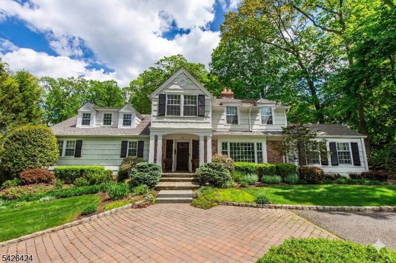 Nestled within the prestigious Deerfield section of Short Hills, this distinguished residence offers a rare opportunity to own a home defined by timeless elegance, expansive living spaces, and exceptional privacy.