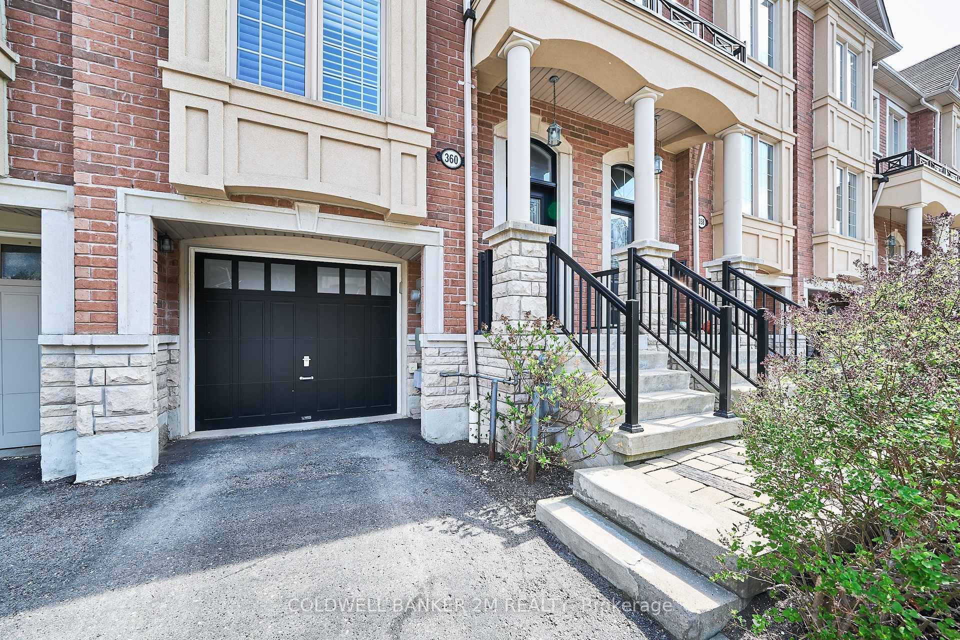 Elegant Executive Townhome with Professionally Landscaped Backyard !