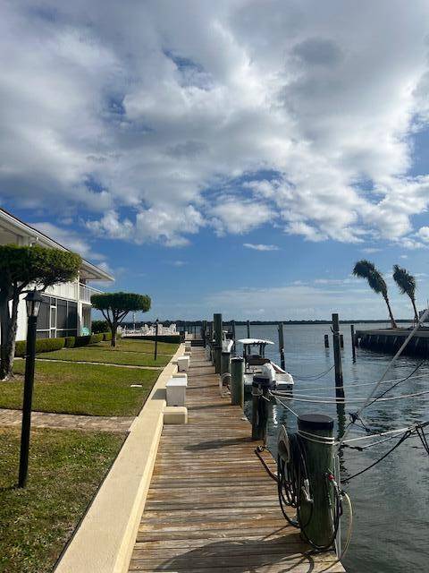 Amazing turn key first floor waterfront condo in desirable community of Marina Harbour.