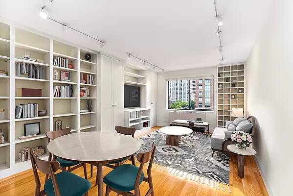 Top floor privacy, custom built ins throughout, and a nearly 24 foot primary bedroom make this beautifully renovated two bedroom home a rare find in Battery Park City.