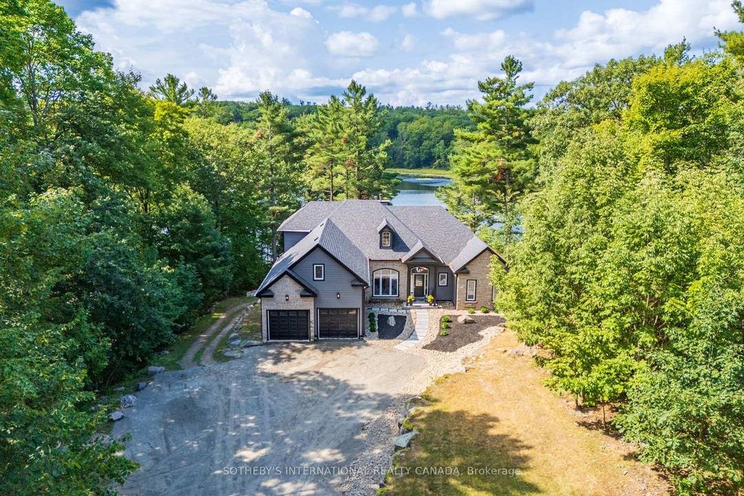 49 Estates Drive offers refined Muskoka living in one of the most prestigious communities in Port Carling.