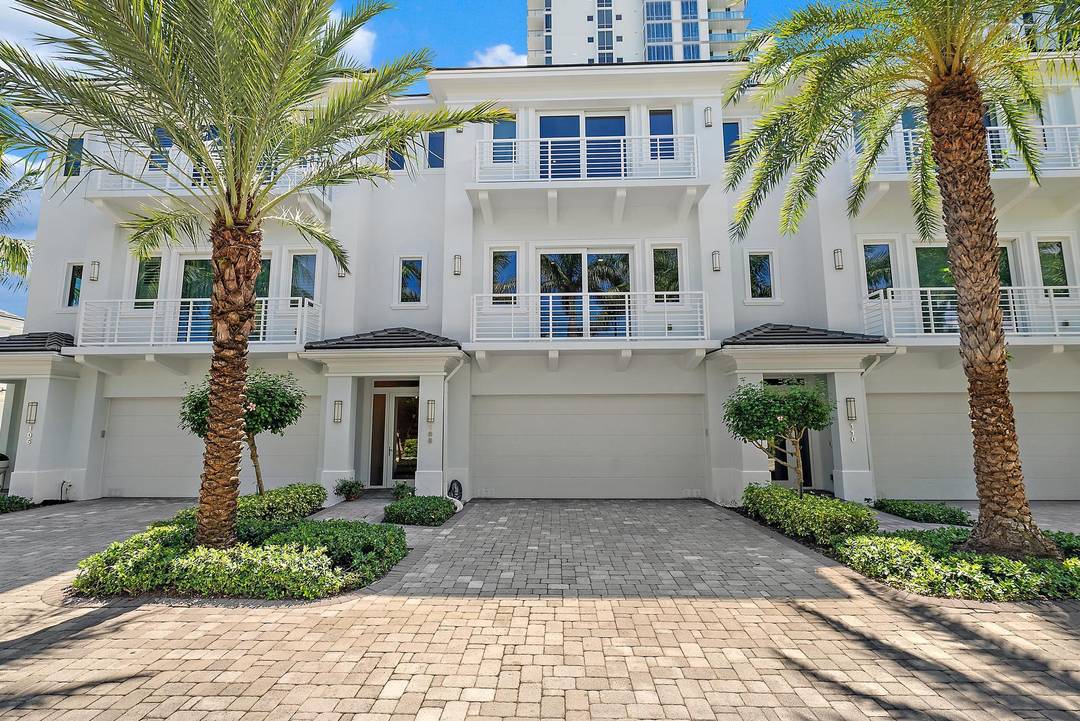 Experience the ultimate in coastal luxury living at Water Club North Palm Beach with this spectacular three story villa showcasing panoramic views of the wide harbor, marina, and resort style ...
