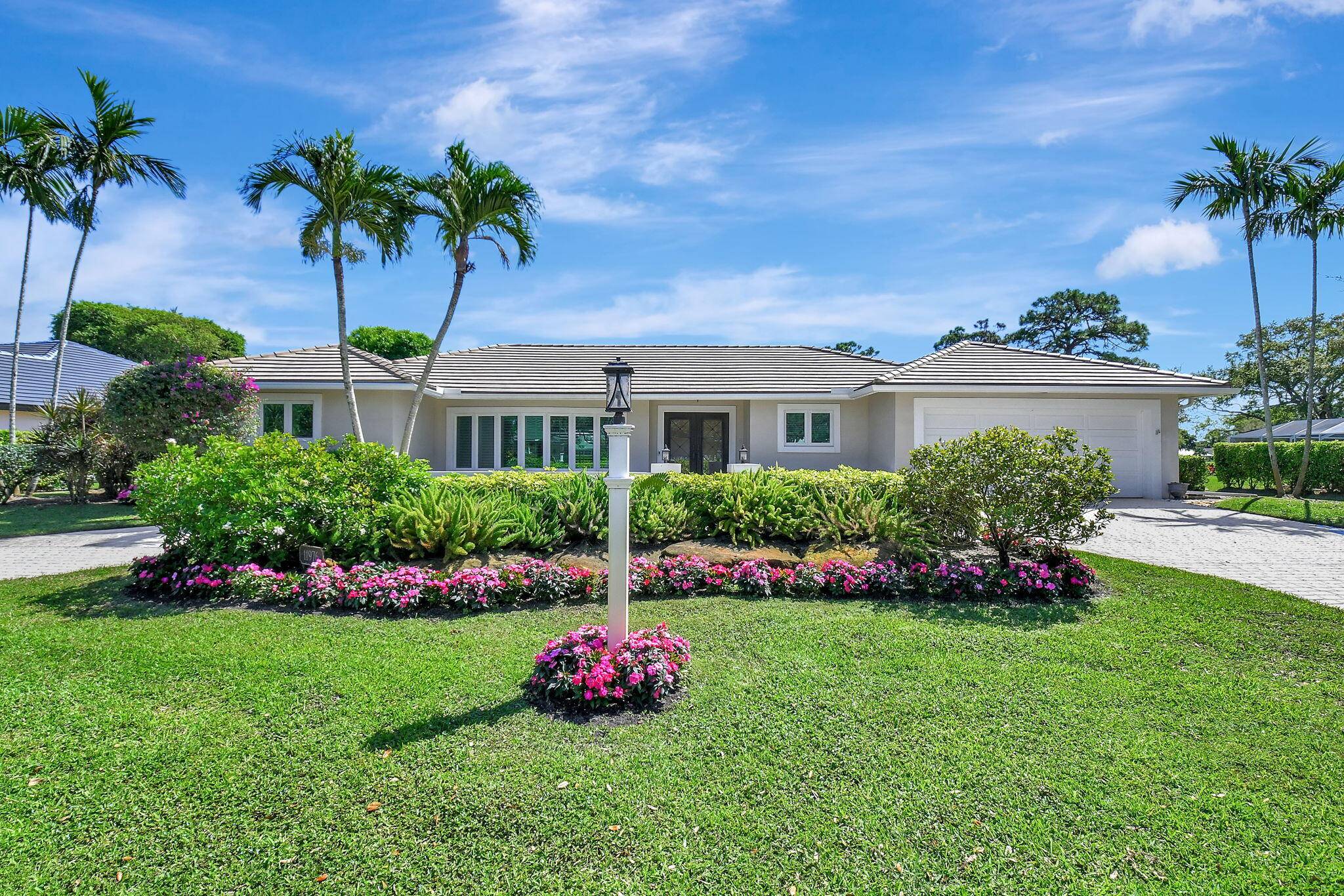 A rare opportunity now available on one of the most exquisite golf course lots in Delray Dunes.