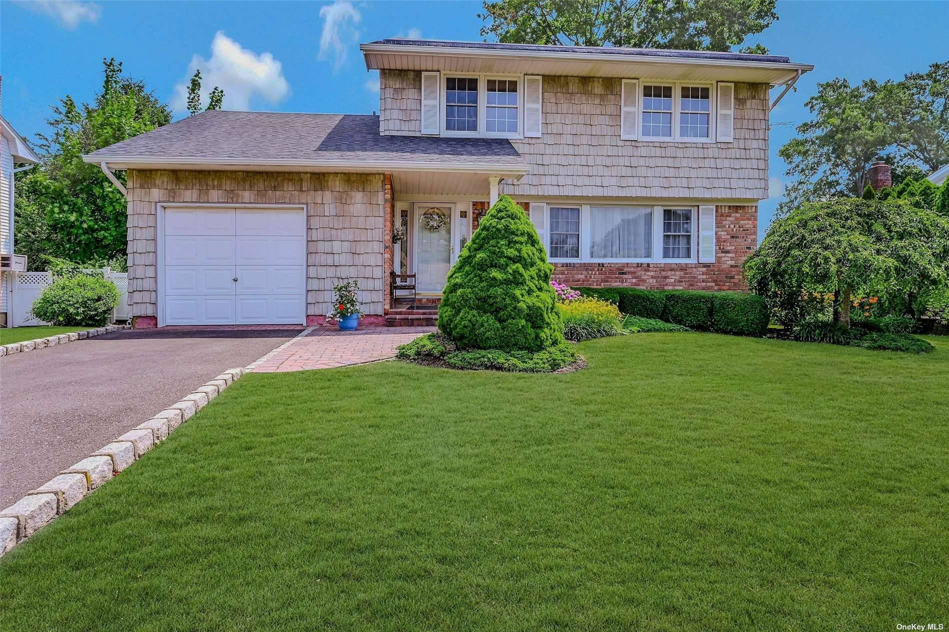 Don't miss this lovely Colonial in Smithtown School District.