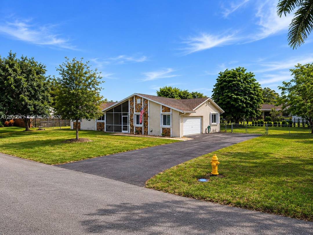 Tucked in the Redland, this beautifully cared for home offers the kind of space, privacy and backyard charm buyers dream about !