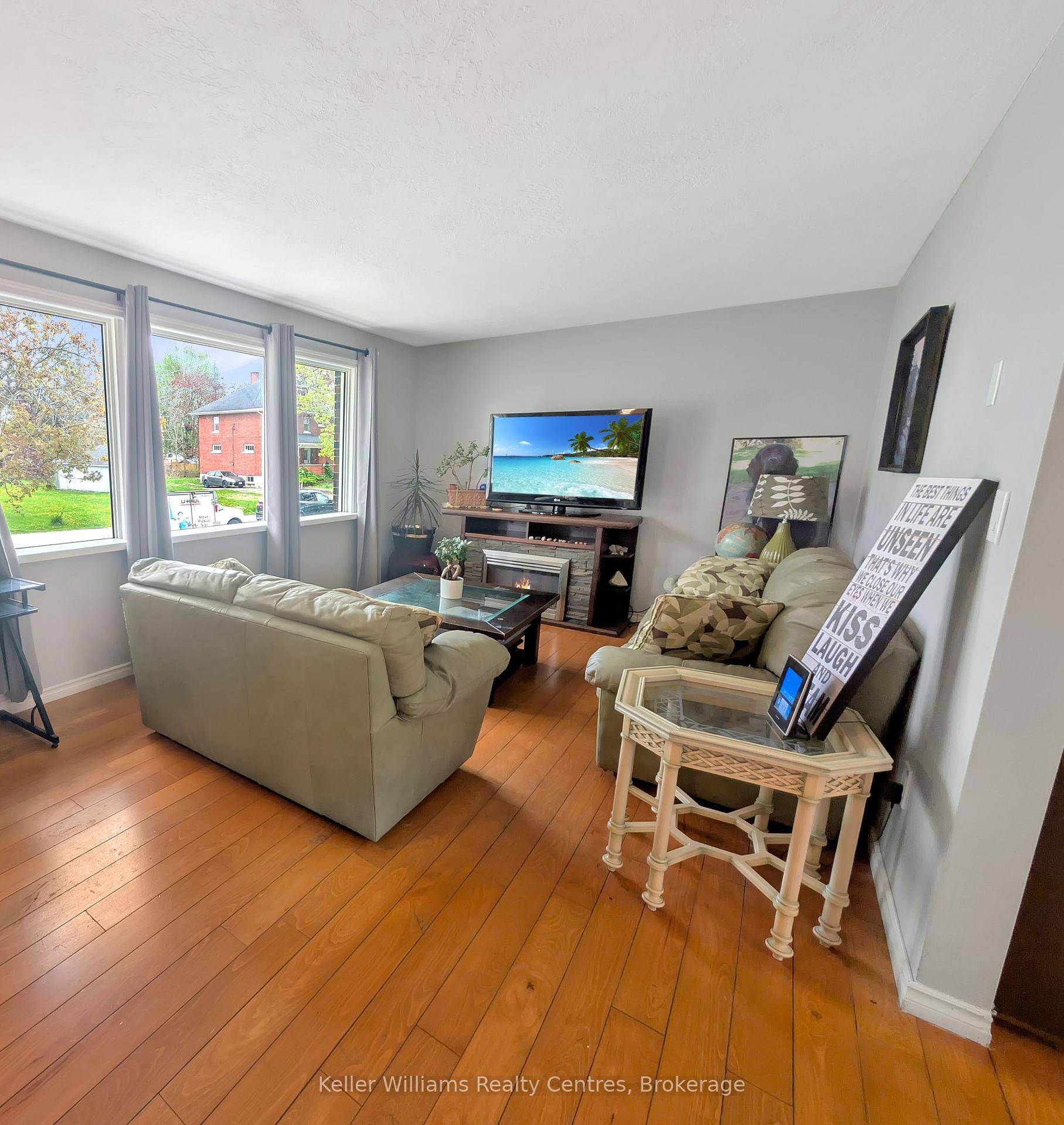 This lovely raised bungalow is situated on a large lot just one block from Main Street in Tara.