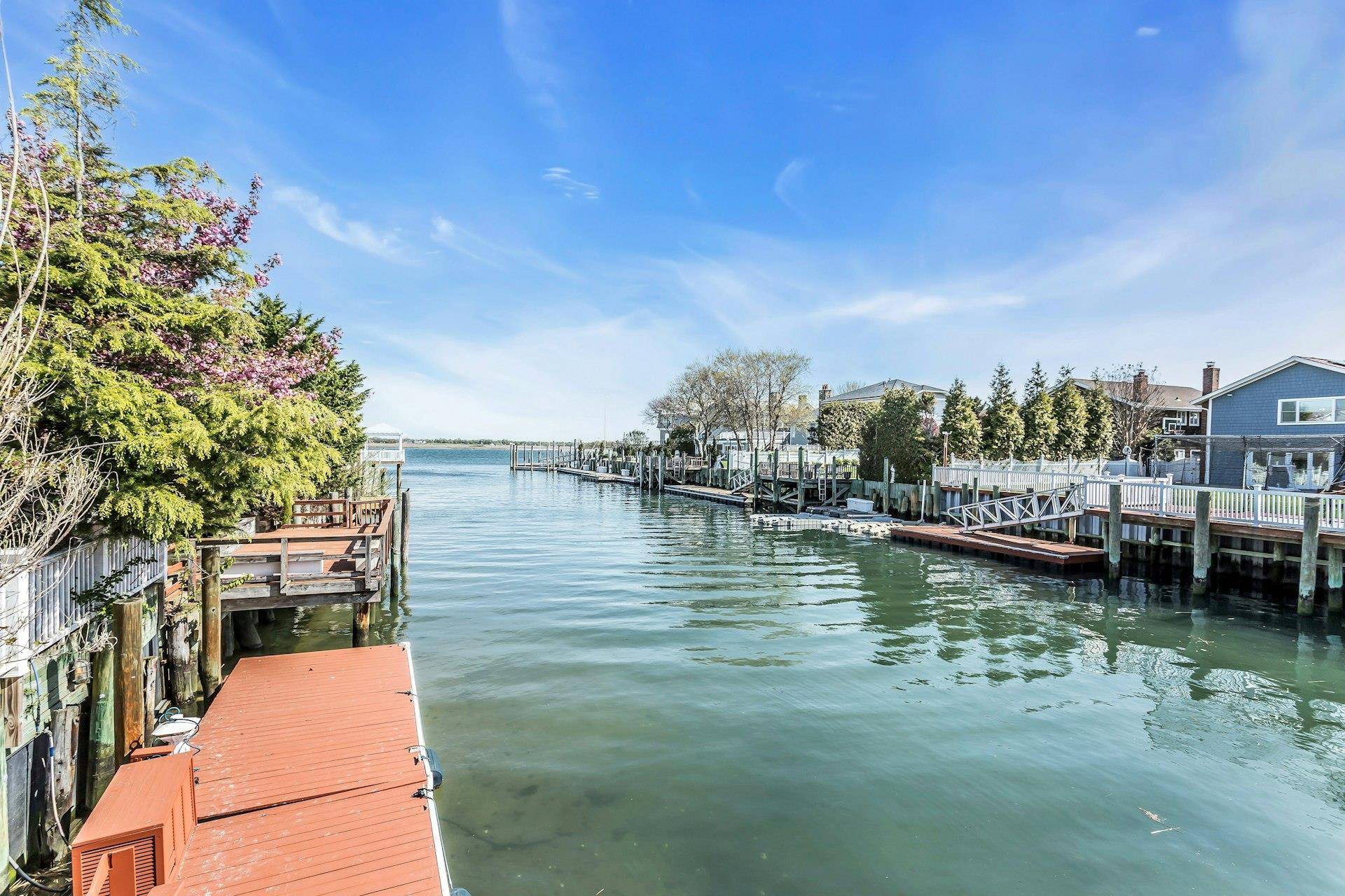 NEW AMAZING PRICE ! 1402 Bay Blvd is a stunning waterfront residence in beautiful Atlantic Beach, NY.