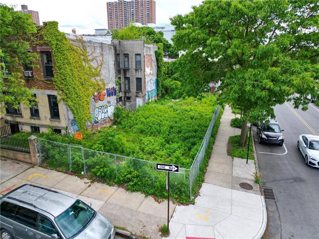 EXCEPTIONAL DEVELOPMENT OPPORTUNITY Unlock the potential of this corner lot in a highly desirable location in Sunset Park !