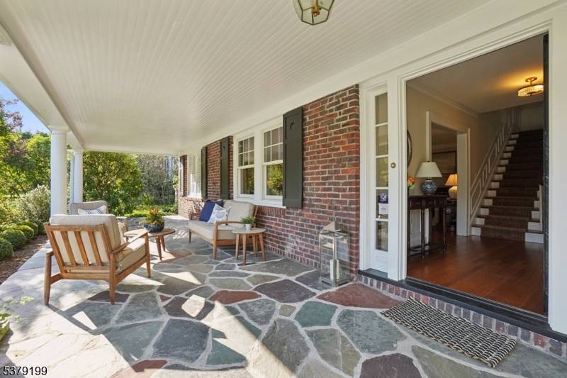 On one of the most idyllic, tree lined blocks in town, this center hall with 1st floor guest ensuite offers beauty, comfort a lifestyle made for memories.