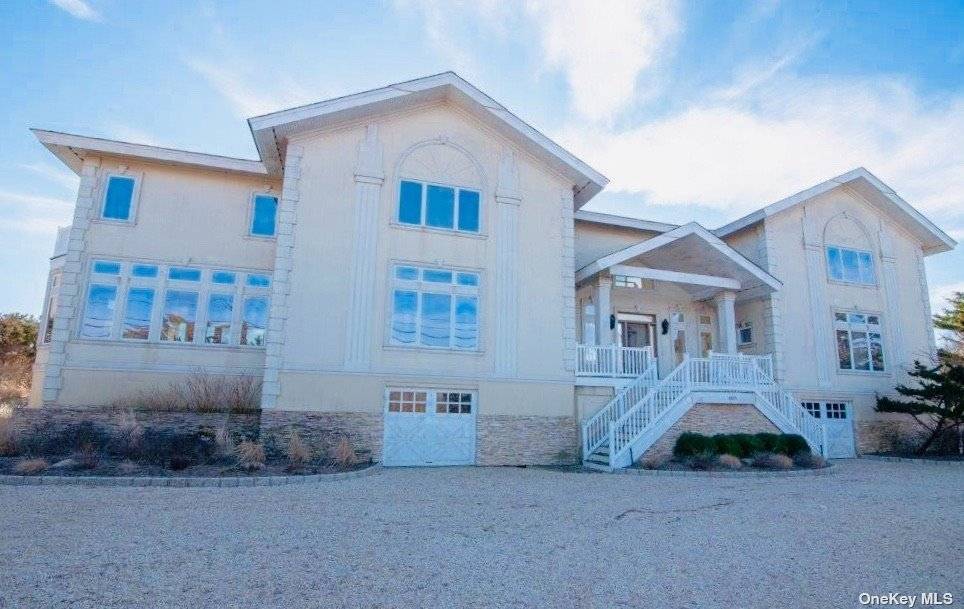 Waterfront Luxury ! Sprawling Oceanfront home on prestigious Dune Rd.