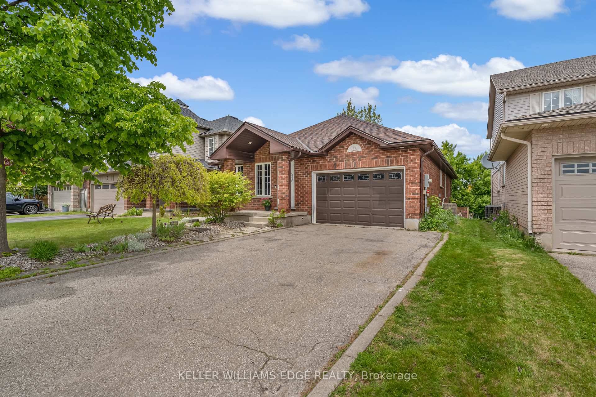 This beautifully updated bungalow is perfectly situated in a prime neighbourhood, backing onto peaceful walking trails and green space.