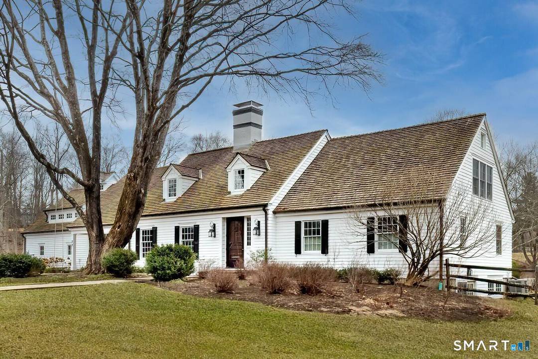 A harmonious blend of storybook Connecticut charm with contemporary living, this spectacular classic Cape style home on sought after Golf Lane is a rare walk to town gem.