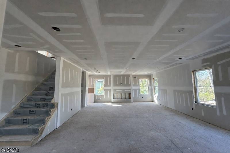 Stunning NEW CONSTRUCTION home, perfectly located on a quite street, yet close to everything.