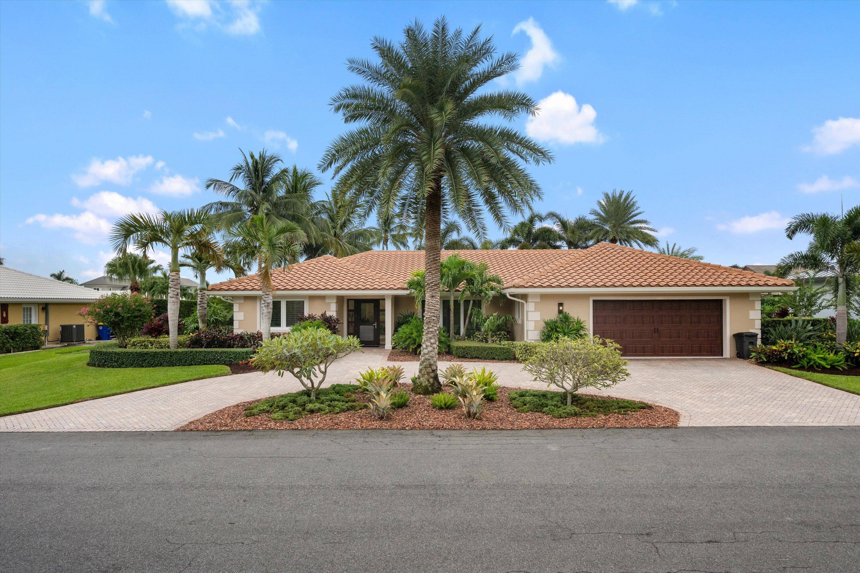 This impeccably renovated 3 bedroom, 2 bath, 2 car garage pool home is nestled in the charming Soundings neighborhood of Hobe Sound, Florida.