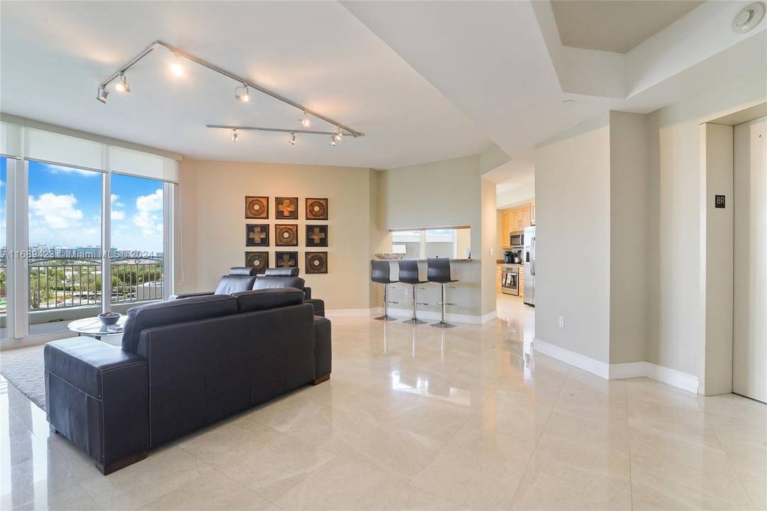 Exceptional residence in one of the area s most desirable boutique buildings, showcasing sweeping views of the Intracoastal, Ocean, and city skyline.