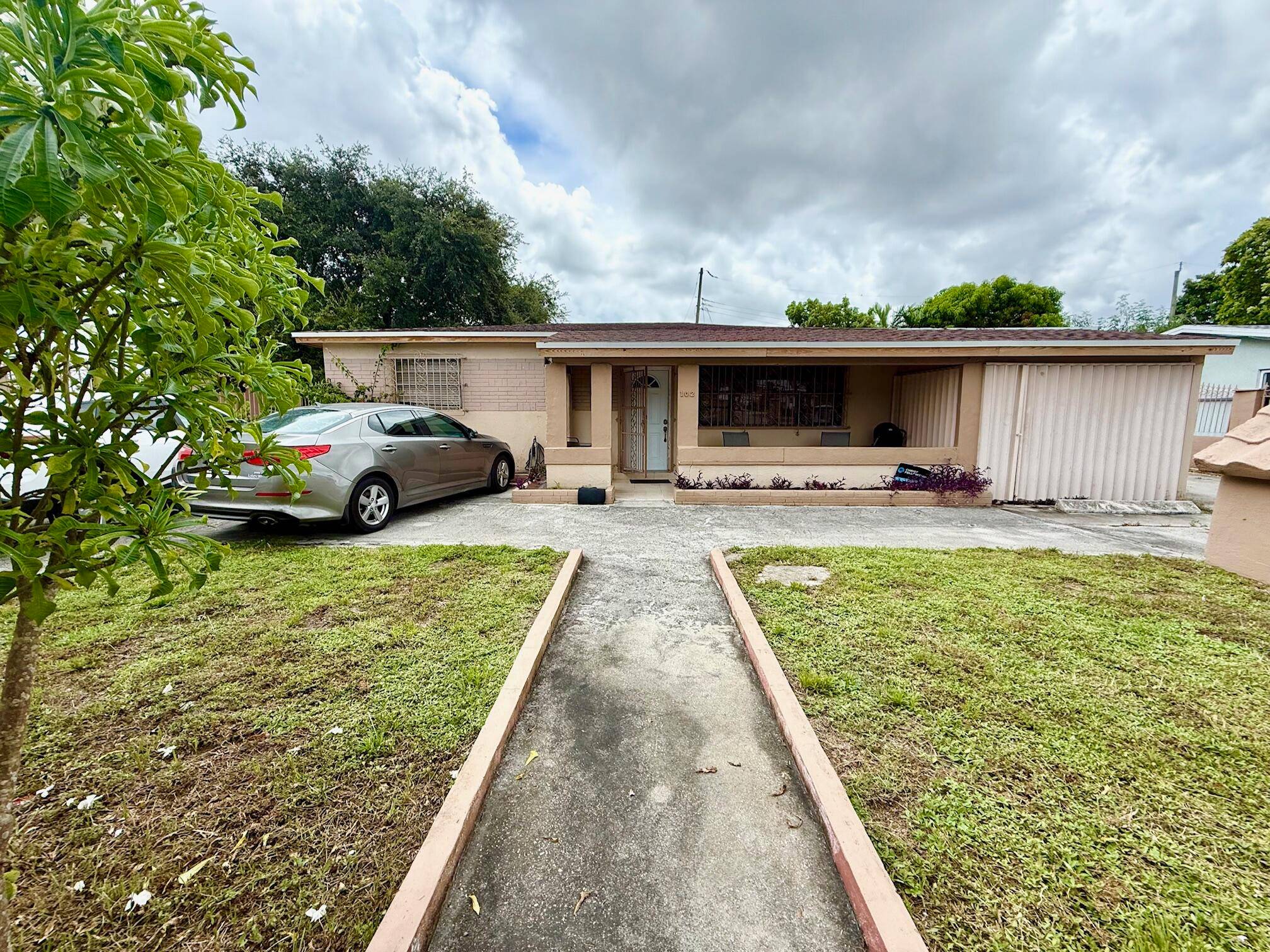 Welcome to this Investor Special or Multi Generational Gem in the Heart of Hialeah !